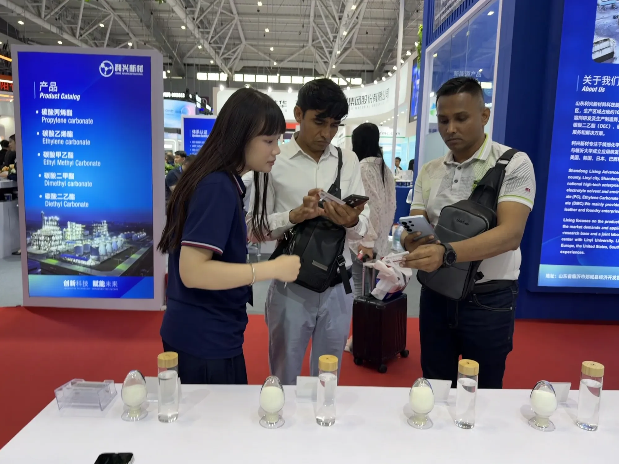 Visitors examining CMC samples with Sentai staff at CIBF 2026