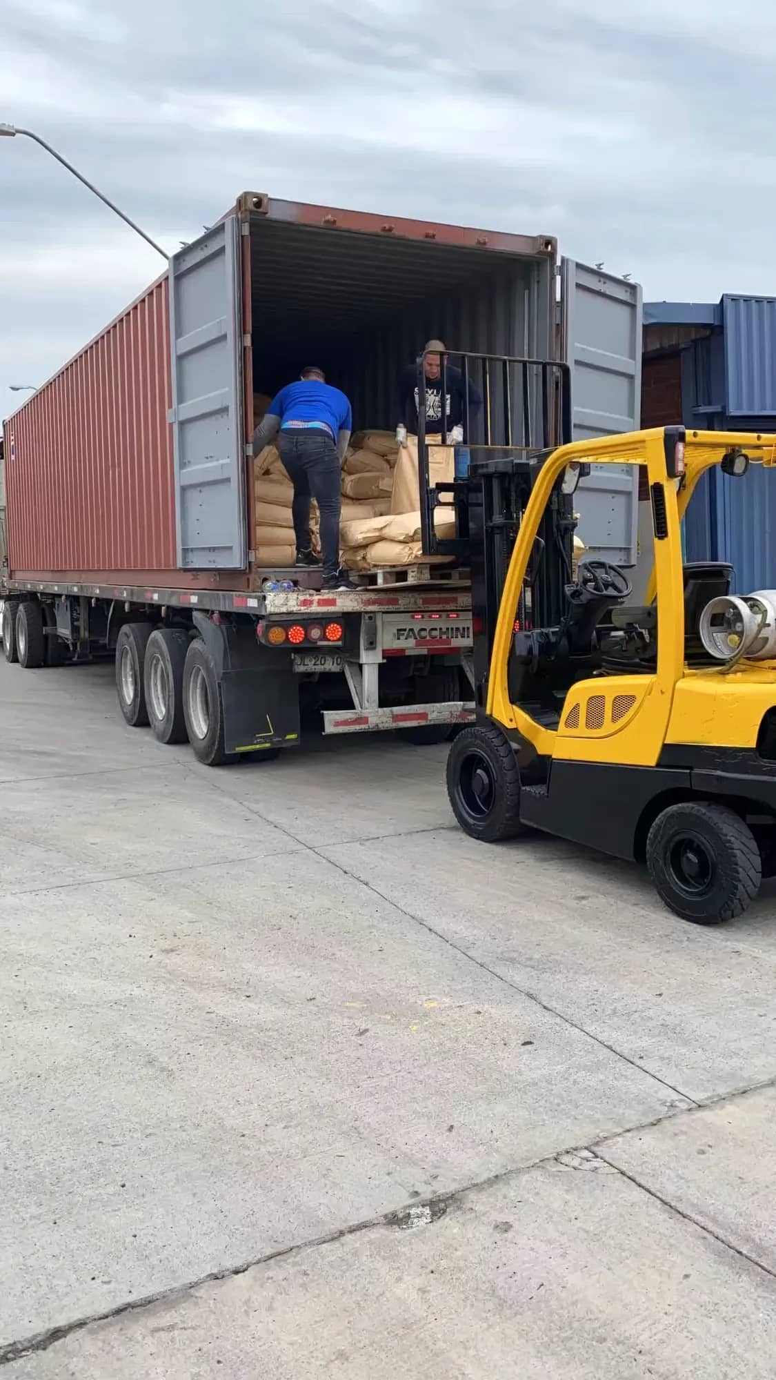 Bags of Sentai CMC being loaded into a shipping container for a customer in Chile