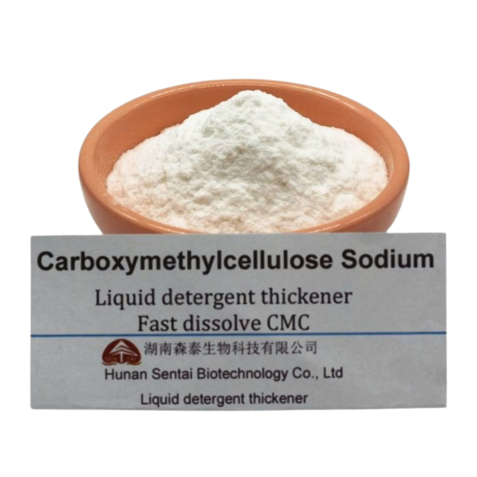 Bowl of white detergent-grade CMC powder behind a Hunan Sentai label card